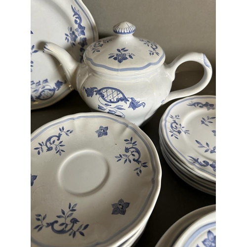 298 - A blue and white tea service by Longchamp of France to include teapot, cups and saucers etc