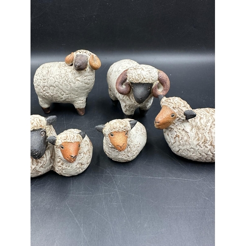 299 - A selection of seven studio pottery sheep figures including four from Cornwall based pottery Animal ... 