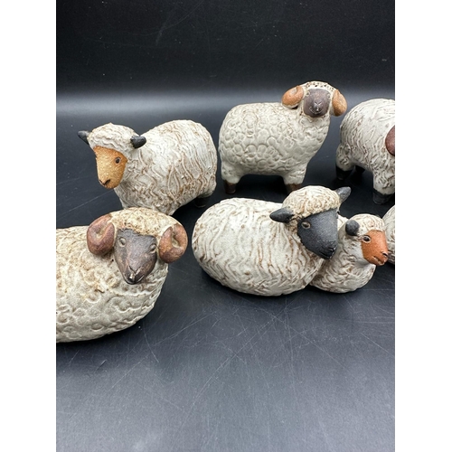 299 - A selection of seven studio pottery sheep figures including four from Cornwall based pottery Animal ... 