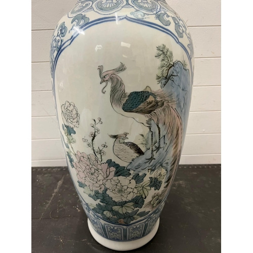 301A - A floor standing blue and white vase (H78cm)