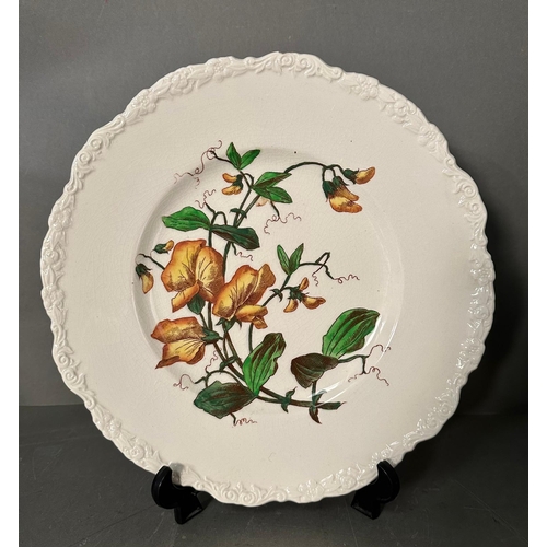 305 - Four Cauldon flower plates 28cm in diameter.