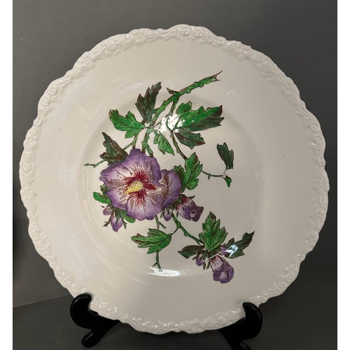 305 - Four Cauldon flower plates 28cm in diameter.