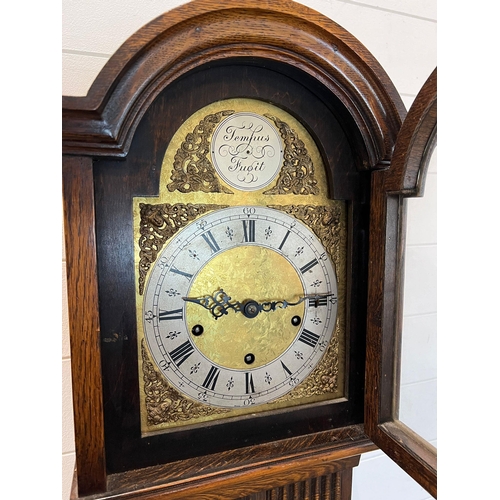 320 - An oak Grand daughter clock with Westminster charms (H170cm W30cm)