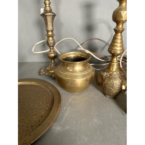 326 - A quantity of brass items to include candlestick, fire dogs and a mirror