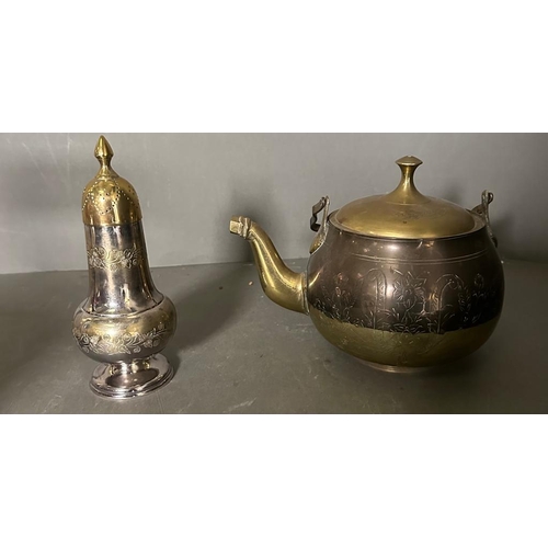 331 - A selection of brass and copper items to include tea pots, egg cups and a sugar shaker