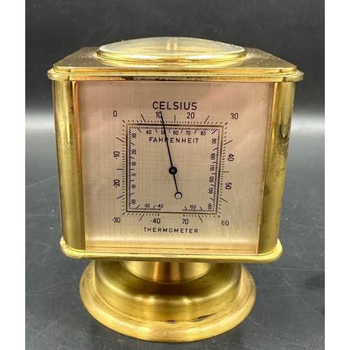 345 - A vintage brass Angelus desk clock/weather station. Having rotating cube shaped body with alarm cloc... 