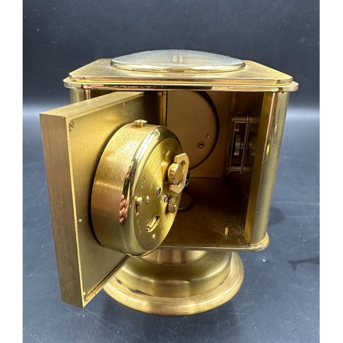 345 - A vintage brass Angelus desk clock/weather station. Having rotating cube shaped body with alarm cloc... 