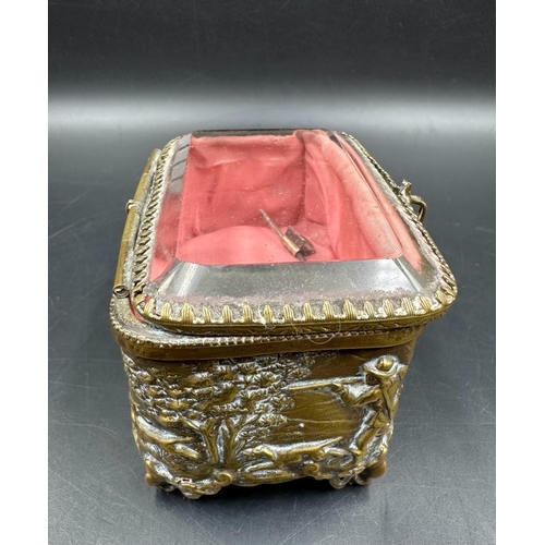 361 - An antique French, bevelled edge glass topped jewellery box with hunting scene decoration.