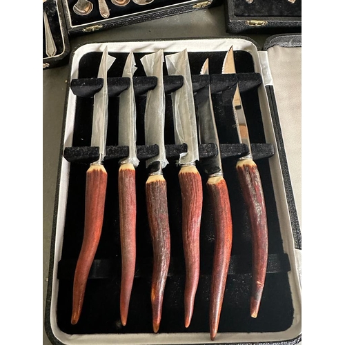 362 - Five  boxes of cutlery to include a boxed set of horn handled steak knives.