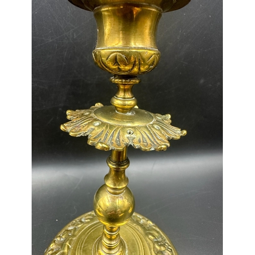 366 - Two pairs of ornate brass candlesticks