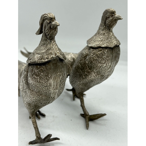 369 - A pair of white metal pheasants