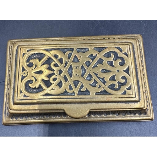 370 - A 19th Century brass inkwell with glass insert and a brass trinket box on feet