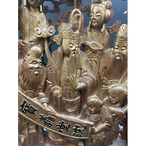 371 - A carved Chinese wooden screen, 15cm W x 21.5cm H