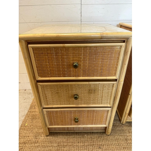 38 - A three drawer bamboo and cane chest of drawers and a matching smaller three drawer chest (H72cm W79... 