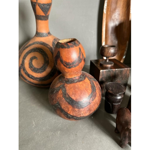 390 - A selection of tribal treen and other Africana to include bowls, gourds and carved animals