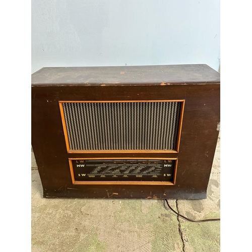 395 - A selection of vintage radios and record players to include a Monarch three speed, a Collardo tape T... 