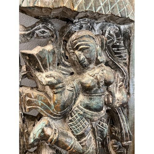 4 - An Asia carved wooden panel, the six panels featuring dancing figurines, all boarded with a geometri... 