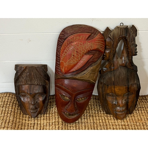 400 - Tribal wooden art masks and spere