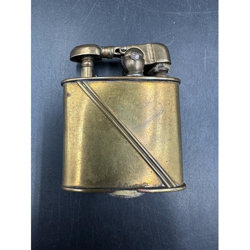 405 - A pre war Dainty lighter in pen form and an unmarked brass lighter