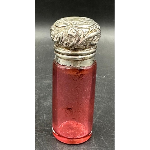 423 - A cranberry glass and silver scent bottle hallmarked for Birmingham 1899.