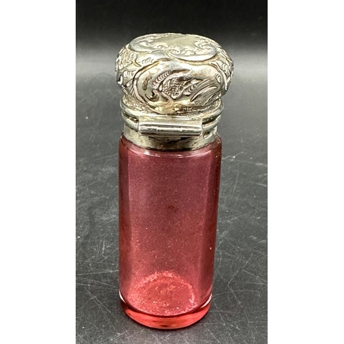 423 - A cranberry glass and silver scent bottle hallmarked for Birmingham 1899.