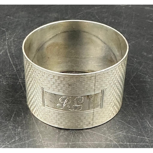 427 - Two hallmarked silver napkin rings, one hallmarked for Birmingham 1944 by H Bros and the other for B... 