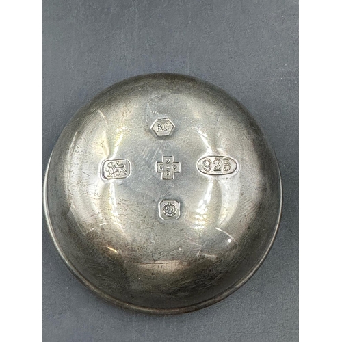 431 - A silver paperweight Carr's Sheffield 2000, with wooden base along a with a hallmarked silver single... 