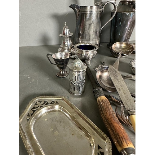 441 - A selection of silver plate and white metal items to include candlesticks, cruets and cutlery