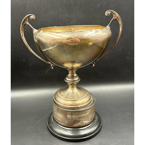 442 - A silver trophy, engraved, hallmarked for Birmingham, approximate total weight excluding stand is 30... 