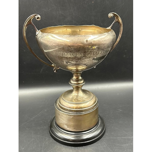 442 - A silver trophy, engraved, hallmarked for Birmingham, approximate total weight excluding stand is 30... 