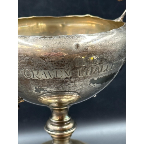 442 - A silver trophy, engraved, hallmarked for Birmingham, approximate total weight excluding stand is 30... 