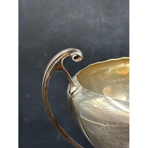 442 - A silver trophy, engraved, hallmarked for Birmingham, approximate total weight excluding stand is 30... 