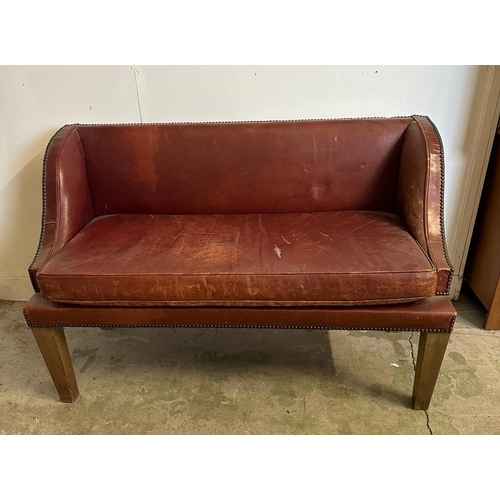 45 - A two seater red leather bench seat with brass studded detail AF