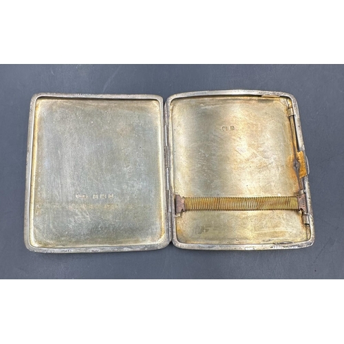 458 - A silver cigarette case, hallmarked for Birmingham by William Henry Sparrow 1912.