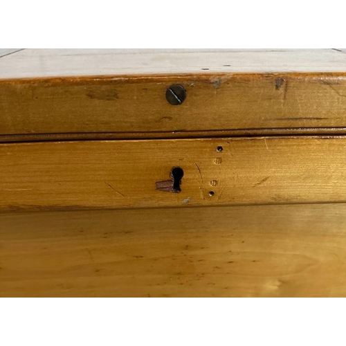 46 - A large pine panelled blanket box or chest with brass drop handles to side (H70cm W109cm D73cm)