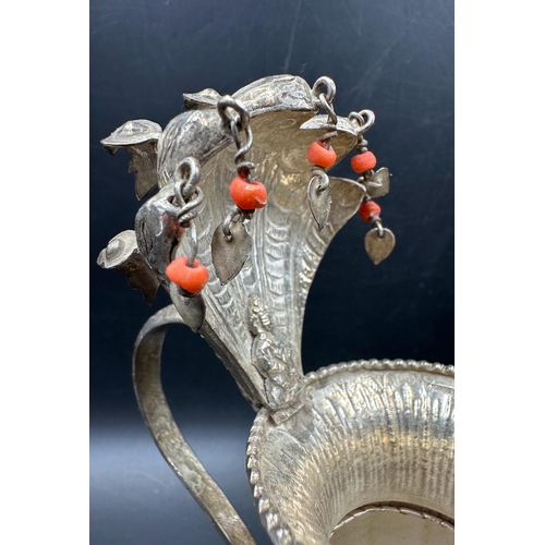 460 - A silver Sukunda ornament, 190g