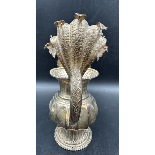 460 - A silver Sukunda ornament, 190g