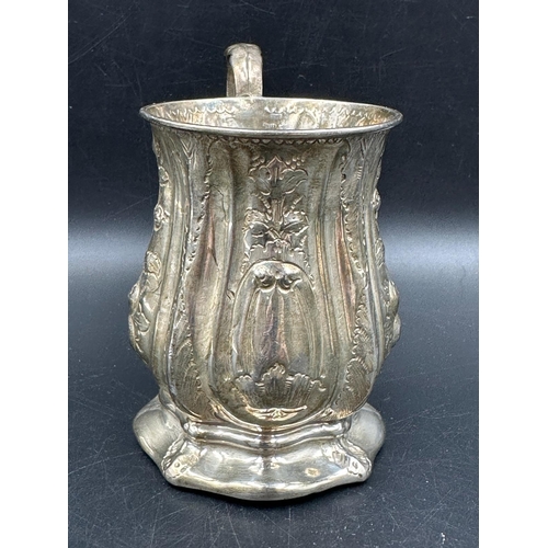 467 - A Victorian ornate silver tankard, approximate 8.5cm high, Birmingham 1868, approximate total weight... 