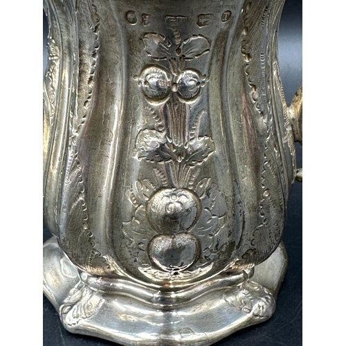 467 - A Victorian ornate silver tankard, approximate 8.5cm high, Birmingham 1868, approximate total weight... 