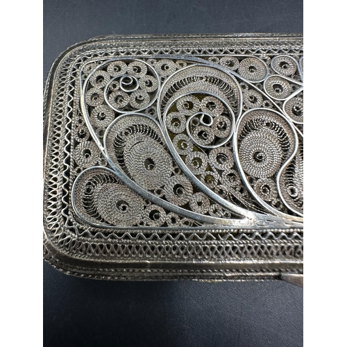 468 - A silver filigree cigarette case