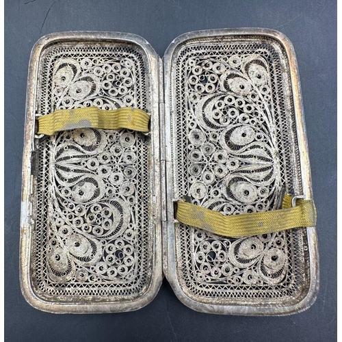 468 - A silver filigree cigarette case