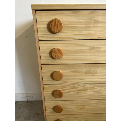 48 - A six long drawer veneered chest of drawers with circular pine handles AF