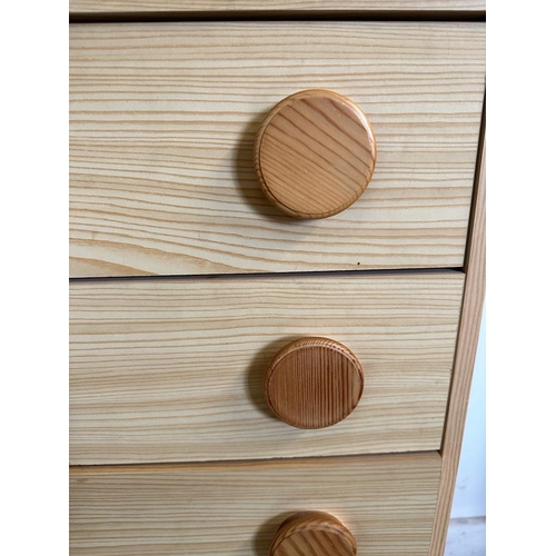 48 - A six long drawer veneered chest of drawers with circular pine handles AF