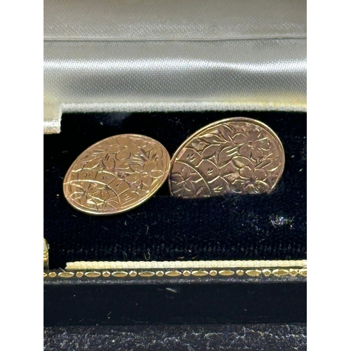 502 - A boxed pair of Edwardian 9 carat gold, foliate engraved design cuff links, hallmarked for Chester 1... 