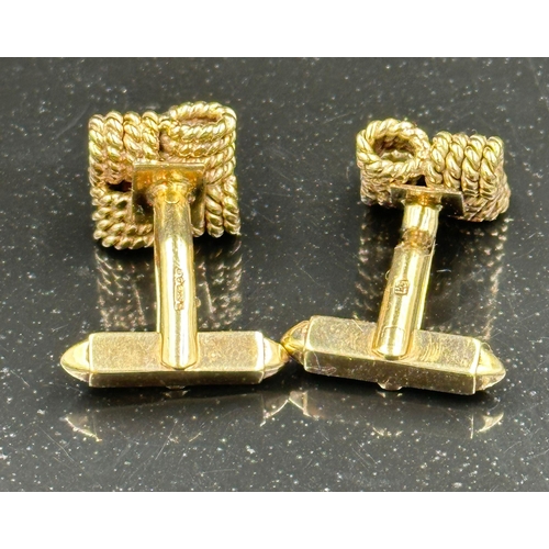 503 - A boxed pair of woven knot design 9ct gold cuff links, approximate total weight 12.3g