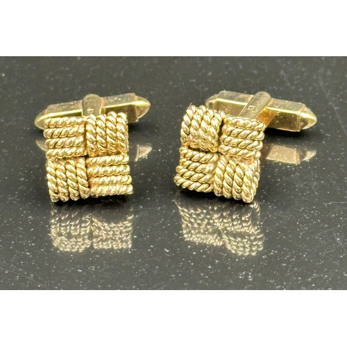 503 - A boxed pair of woven knot design 9ct gold cuff links, approximate total weight 12.3g