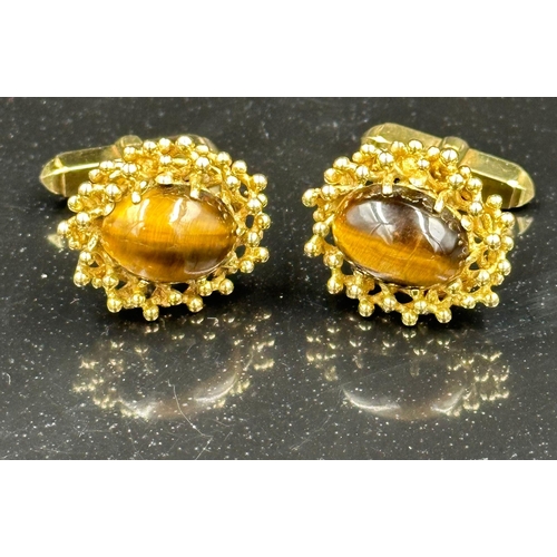 505 - A pair of fabulous Tigers Eye 9ct gold cuff links, hallmarked in London and with an approximate weig... 