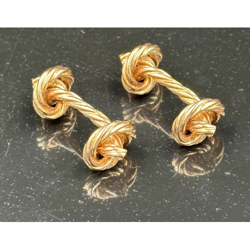 508 - A pair of 9ct gold knot themed cuff links with a total approximate weight of 12.7g and a width of 30... 