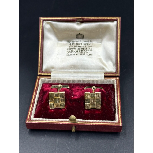 511 - A pair of 18ct gold vintage Garrard & Co cuff links, with an approximate total weight of 10g.