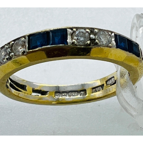 519 - A sapphire and diamond eternity style ring in 18ct gold, approximate size L